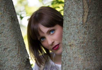 beautiful blue-eyed girl in the park