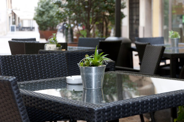 tables of street cafe in the Italian city