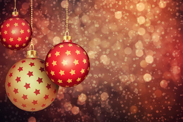 Fototapeta na wymiar Set of red and gold Christmas globes hang on a holiday background with copy space. 