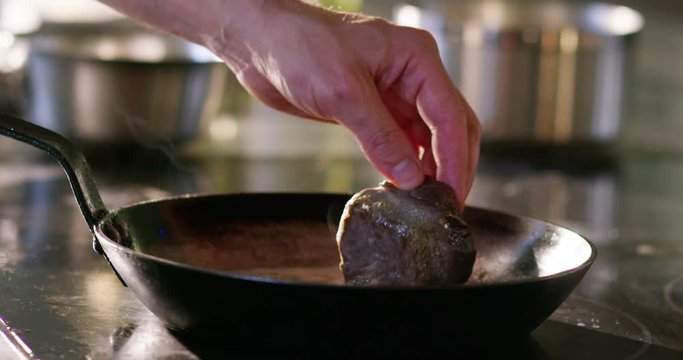 an experienced cook a filet fried with fresh food, meat and tender and soft flesh with a genuine taste
