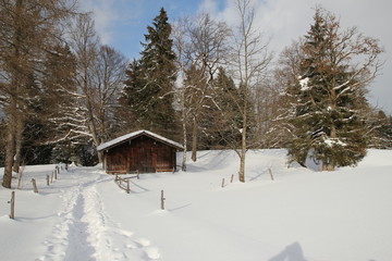 Fototapeta na wymiar Winterlandschaft mit Hütte