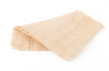 Burlap napkin isolated on white background. Top view.