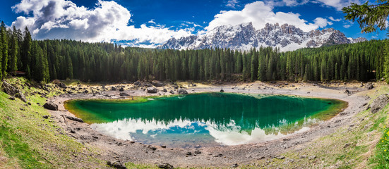 Breathtaking view to mountain Carezza lake in Dolomites, Italy - obrazy, fototapety, plakaty