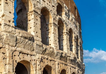 Colosseum, cultural and historical monument in Rome, a fragment of a wall with damages
