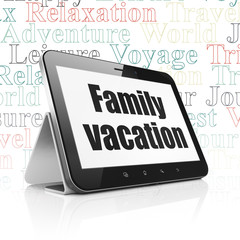 Vacation concept: Tablet Computer with Family Vacation on display