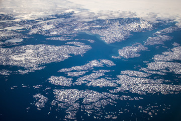 Aerial Greenland white ice landscape mountains