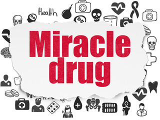 Fototapeta premium Medicine concept: Miracle Drug on Torn Paper background