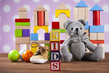 Baby World toy collection on on wooden background