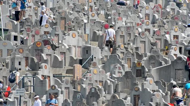 Time Lapse of Crowded Hong Kong Cemetery with Chinese Inscribed Headstones