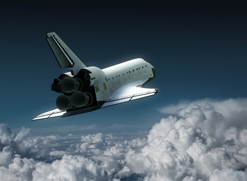 Space Shuttle In The Clouds