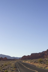 Landscape image of the highway winding and twisting through the Valley of Fire State Park outside of Las Vegas, Nevada.