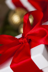 Christmas balls, Gift box with red ribbon, Holiday background