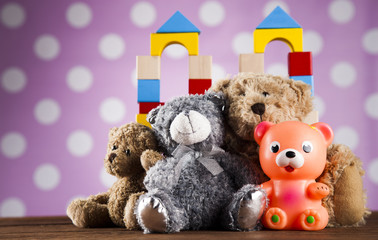 Teddy bears on on wooden background
