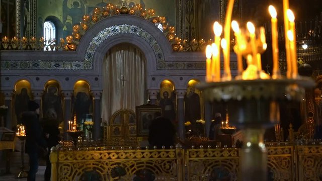 Candlestick With Candles on the Foreground. in the Depths of the Christian Cathedral