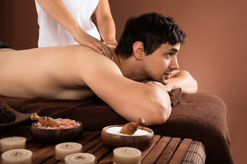 Obraz na płótnie Canvas Man Receiving Shoulder Massage