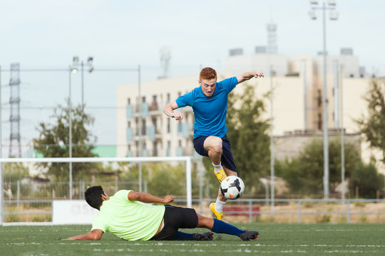 Two players playing soccer