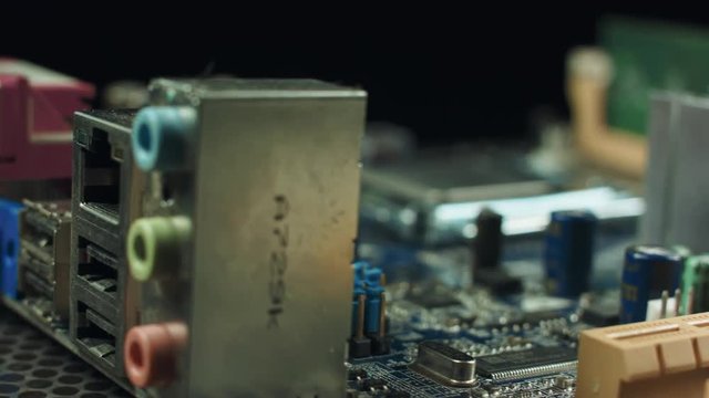 motherboard with CPU spinning on a black background