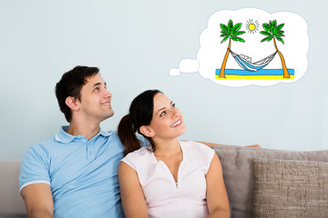Couple Thinking Of Having Vacation Together