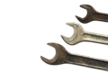 some different vintage wrenches isolated on a white background..