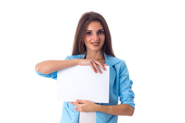 Woman holding white sheet of paper