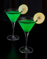 Green Apple Martini on a Black Background