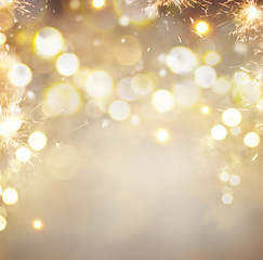 Golden Christmas holiday abstract glitter defocused background