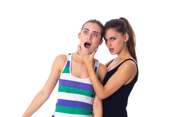 Fototapeta na wymiar Young woman keeping another woman's throat 