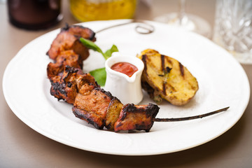 Pork shashlik with grilled potatoes