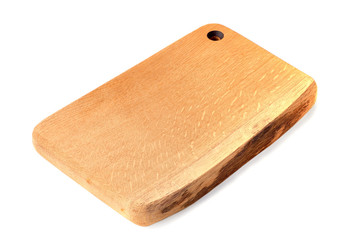 Wooden chopping board on white