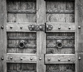 Black-white vintage obsolete elegant wooden door