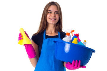 Woman holding cleaning things in washbowl