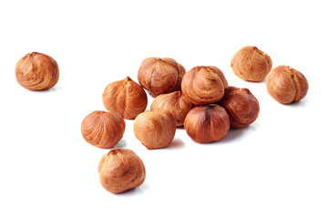 Obraz premium Heap of hazelnuts on white
