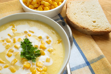 
Sweet corn soup in a white bowl
