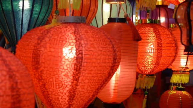 Lighted Chinese Lanterns Swaying in the Wind
