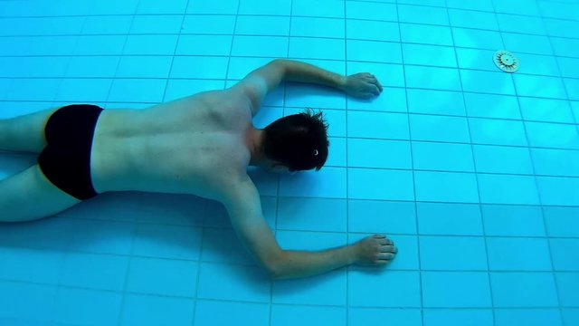Drowning Man On The Bottom Of Swimming Pool