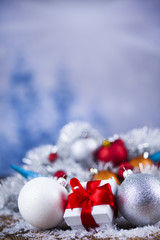 Christmas balls, Gift box with red ribbon, Holiday background
