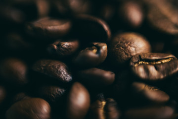 Closeup of heap roasted coffee - ingredient of hot beverage. for background and texture