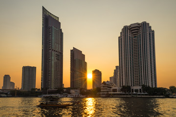 sunset at building in city