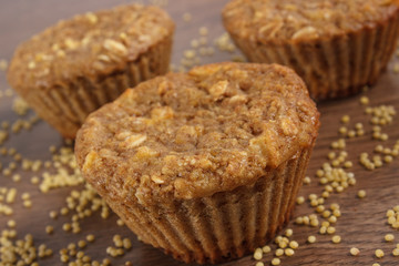 Fresh muffins with millet groats, cinnamon and apple baked with wholemeal flour, delicious healthy dessert