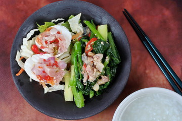Close up of fried kale with salted fish served for rice gruel. 