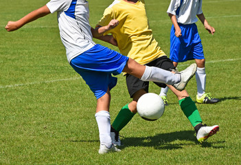 Naklejka premium Children are playing soccer