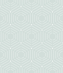 Geometric repeating ornament with hexagonal dotted elements. Seamless abstract modern pattern. Light blue and white pattern
