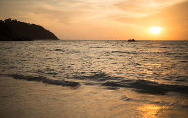 Fototapeta na wymiar Holiday in Thailand - Beautiful Island of Koh Lipe Sunset with c