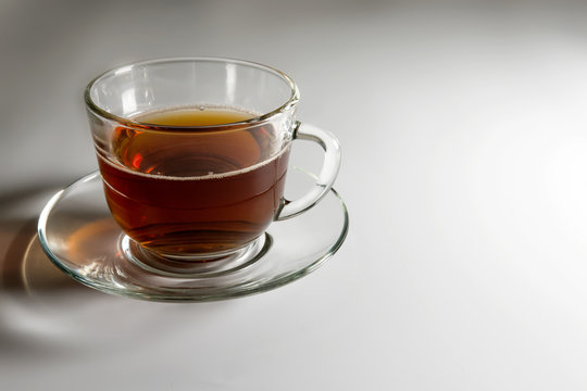 transparent glass cup with tea