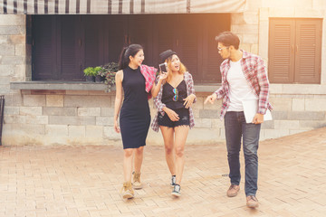 Group of Teenagers Hanging Out In Urban Environment , Summer hol