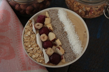 vegan Breakfast banana smoothie with Chia, coconut, cherries, nuts, oatmeal. start your morning with vitamins!