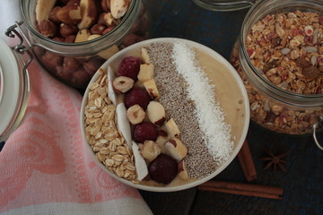 vegan Breakfast banana smoothie with Chia, coconut, cherries, nuts, oatmeal. start your morning with vitamins!