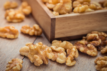 Walnut kernels on wooden table