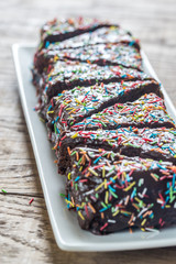Pieces of fudge cake on the plate