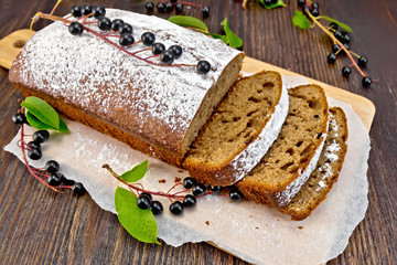 Fruitcake bird cherry cut on board